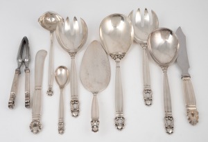 GEORG JENSEN "Acorn pattern" Danish silver serving utensils comprising of salad serving fork and spoon, large serving spoon and fork, gravy ladle, cake slice server, cake knife, large butter knife, jam spoon and nut crackers, (10 items), 530 grams silver weight (excluding steel blade cake knife and steel ended nutcracker).