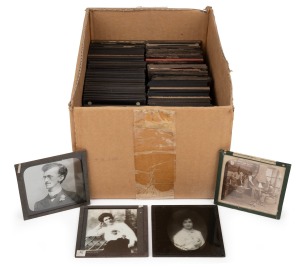 A collection of 83 x 83mm photographic glass slides for magic lantern, many hand-tinted; mostly churches (Westminster Abbey) and cities (New York). (130+ items)