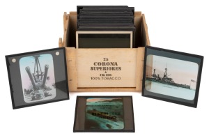 BATTLESHIPS: Group of 83 x 83mm glass slides for magic lantern, mostly photographic types, including of note several views related to the sinking of the SMS Emden by the HMAS Sydney, as well as a curious view of a submarine's periscope, cleanly pierced by