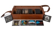 A collection of 83 x 83mm glass slides for magic lantern, in 10 x 38 x 11cm timber case; subjects include the laying of the first transatlantic telegraph cable, British royalty, and others. (70+ individual slides)