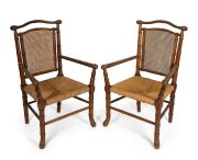 A pair of antique English beech armchairs in the Japanese style, 19th/20th century, ​​​​​​​103cm high, 67cm across the arms.
