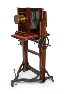 KODAK: "Studio Camera No. 1 10 x 8" large format studio camera, late-19th/early-20th century, plate dimensions 16.5 x 21.5cm, Taylor-Hobson Cooke Portrait Anastigmat Series IIB 20" f4.5 brass lens [#189261] with cap, intact black bellows, on adjustable ti