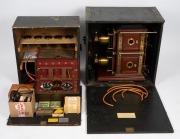 BIUNIAL MAGIC LANTERN: Large c. 1880s mahogany and brass example with impressive quadruple-extension lens barrels, tin chimney element, limelight burner apparatus, four side-opening doors with red or blue peepholes, together with two condenser lenses and - 8