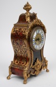 An antique French boule cased spring table clock with ormolu mounts, Roman numeral enamel cartouche dial with eight day time and gong striking movement, 19th/20th century, 34cm high. - 2