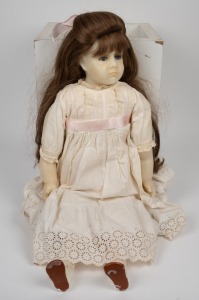 A vintage wax articulated doll in hand-made period costume, ​​​​​​​71cm high.