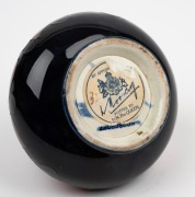 MOORCROFT "Pomegranate" English pottery miniature baluster vase on blue ground, impressed "Moorcroft, Made In England" and with original paper label, 6.5cm high. - 3
