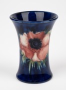 MOORCROFT "Anemone" English pottery miniature spill vase on blue ground, impressed "Moorcroft, Made In England" with blue signature mark, 9cm high. - 2