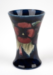 MOORCROFT "Pansy" English pottery miniature spill vase on blue ground, impressed "Moorcroft, Made In England", 9cm high.
