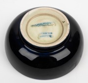 MOORCROFT "Iris" English pottery salt cellar, impressed "Moorcroft, Made In England" with original paper labels, 3cm high, 7.5cm diameter. - 2