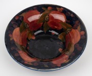MOORCROFT "Pomegranate" English pottery bowl on blue ground, impressed "Moorcroft, Made In England", 7cm high, 20.5cm diameter. - 2