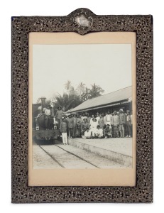 [RAILWAY INTEREST] circa 1890s albumen photograph depicting the locomotive "No. 4 Leila" and the engine driver, fireman, railway staff and Mr. J. W. Weatherston (in white, seated at front) at the Kuala Pilah Railway Station, Malaya, circa 1895-1910. House
