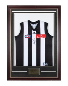 NATHAN BUCKLEY: Signed Collingwood jersey, framed and glazed with a plaque recording his 280 games for the club, 114 x 82cm overall.