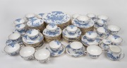 ROYAL WORCESTER "Blue Dragon" porcelain dinner and tea ware, complete set for twelve plus milk jug and sugar basin, mid 20th century, (98 items), factory mark to base.