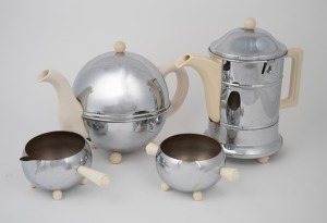 A vintage English porcelain and chrome finished four piece tea service with bakelite fittings, mid 20th century, (4 items), the largest 21cm high.
