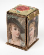 An antique folding sewing box with chromolithograph decoration and silk lined interior, attractive fold-out design with original contents, 19th century, ​​​​​​​12cm high. - 2