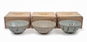 BINH THUAN SHIPWRECK group of three Chinese porcelain bowls, late Ming, circa 1600, housed in bespoke timber boxes with Christies labels and branding, 9cm high, 20cm diameter each.