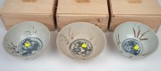 BINH THUAN SHIPWRECK group of three Chinese porcelain bowls, late Ming, circa 1600, housed in bespoke timber boxes with Christies labels and branding, 9cm high, 20cm diameter each. - 2
