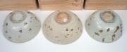 BINH THUAN SHIPWRECK group of three Chinese porcelain bowls, late Ming, circa 1600, housed in bespoke timber boxes with Christies labels and branding, 9cm high, 20cm diameter each. - 3