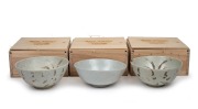 BINH THUAN SHIPWRECK group of three Chinese porcelain bowls, late Ming, circa 1600, housed in bespoke timber boxes with Christies labels and branding, 9cm high, 20cm diameter each.