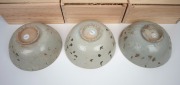 BINH THUAN SHIPWRECK group of three Chinese porcelain bowls, late Ming, circa 1600, housed in bespoke timber boxes with Christies labels and branding, 9cm high, 20cm diameter each. - 3