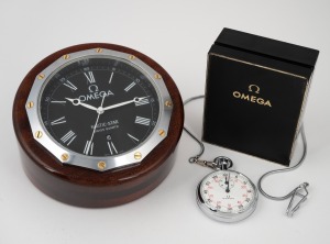 OMEGA "Nautic-Star" desk clock with quartz movement and date aperture, in sectional mahogany case; together with an OMEGA stopwatch with safety chain in nickel plated case and original box of issue with instructions, (2 items), the desk clock 14cm across 