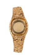 An impressive 14ct solid gold watch bracelet and case, mid to late 20th century, stamped "14ct", 80.9 grams total including crystal.