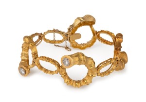 LEO AMMAVUTA stunning Australian design and manufactured 18ct yellow gold bracelet, adorned with four brilliant cut white diamonds, late 20th century, stamped "Kt18", an impressive 54.5 grams total.