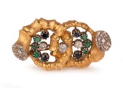 LEO AMMAVUTA stunning Australian design and manufactured 18ct yellow gold brooch, adorned with diamonds, emeralds and sapphires in 18ct white gold mounts, late 20th century, 5cm wide, an impressive 34 grams total.