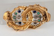 LEO AMMAVUTA stunning Australian design and manufactured 18ct yellow gold brooch, adorned with diamonds, emeralds and sapphires in 18ct white gold mounts, late 20th century, 5cm wide, an impressive 34 grams total. - 2