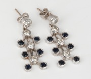 A pair of 18ct white gold, diamond, and sapphire earrings, 8.3 grams total.