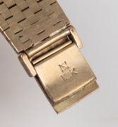 I.W.C. (INTERNATIONAL WATCH COMPANY, SCHAFFHAUSEN) gold watch bracelet with clasp, stamped "I.W.C. 18K" (Note: Tests as 15ct gold or higher), 44 grams total. - 2