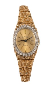 CONTINENTAL Geneva quartz ladies cocktail wristwatch in 14ct gold case with white diamond mounted bezel and 14ct gold bracelet and clasp, 33 grams not including movement.