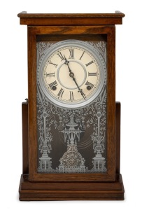 SESSIONS antique American shelf clock in oak case, with spring driven eight day time and gong striking movement, early 20th century, 43cm high.