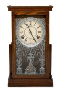 SESSIONS antique American shelf clock in oak case, with spring driven eight day time and gong striking movement, early 20th century, 43cm high.