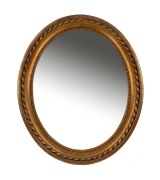 An antique oval convex mirror in gilt frame, 19th century, 60 x 51cm.