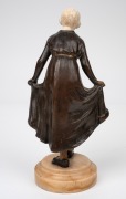 DOMINIQUE ALONZO (active 1910-1930) "The Curtsy" Art Nouveau patinated bronze statue with finely carved ivory head, on onyx base, stamped "ALONZO, ETLING, PARIS", 21cm high overall. - 2