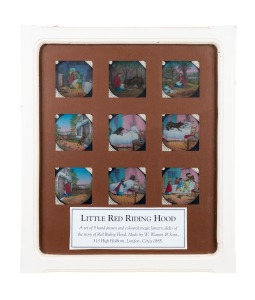 LITTLE RED RIDING HOOD: Set of 9 hand-illustrated glass slides for magic lantern by W. Watson & Sons, London; framed and glazed (with glass backing), 46 x 39.5cm overall.