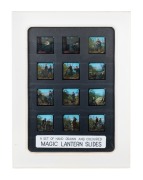 "The Cyclists" c. 1880s narrative set of 12 hand-illustrated glass slides for magic lantern; framed and glazed (with glass backing), 63.5 x 48cm overall.