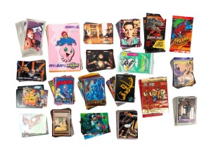 TRADING CARDS: A mostly 1990s accumulation of popular culture trading cards; themes include Aladdin, Jurassic Park, Star Trek, The Crow, Spiderman, Batman, The Terminator, and much else besides. (qty.)