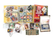 A mostly 1980s accumulation of popular culture trading cards, the majority part-sets but some complete; themes include Batman, Raiders of the Lost Ark, Star Wars, Neighbours, Dallas, The Simpsons, The Flintstones, and many more, as well as a quantity of A