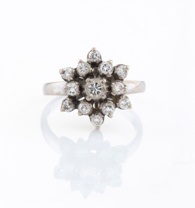 A vintage 14ct white gold and diamond cluster ring, 20th century, 3.7 grams.
