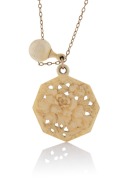 An antique carved ivory pendant on 9ct gold chain, early 20th century, the ivory pendant6.5cm high, the chain 40cm long.