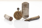 Four assorted pocket cigarette lighters including a souvenir of "FRANCE" and a bullet example, early 20th century, ​​​​​​​the largest 8cm high.