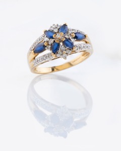 A vintage 9ct gold sapphire and diamond ring, stamped "375", 4.6 grams total.