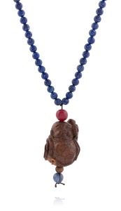 A vintage Chinese lapis lazuli bead necklace with carved wooden figural pendant, 20th century, ​​​​​​​75cm long overall.