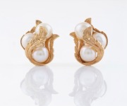 A pair of 14ct gold and pearl clip-on earrings, late 20th century, 12.8 grams total.