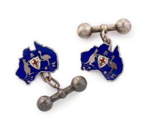 A pair of antique Australian silver and enamel patriotic cufflinks in the form of the map of Australia with coat of arms, circa 1900.