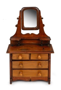An antique apprentice stained pine duchess chest with four drawers, 19th/20th century, 44cm high.