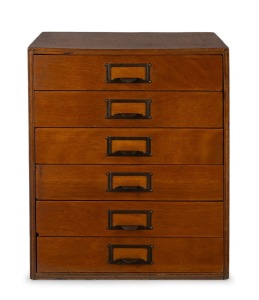 A vintage six drawer desk tidy, constructed from Queensland maple veneered plywood, 20th century, retaining original manufacturer's label "W. C. Penfold & Co. Pty Ltd, Sydney", 45cm high, 39cm wide, 26cm deep.