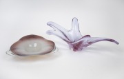 Two Murano glass fruit bowls with amethyst blush, mid 20th century, the larger 36cm wide.